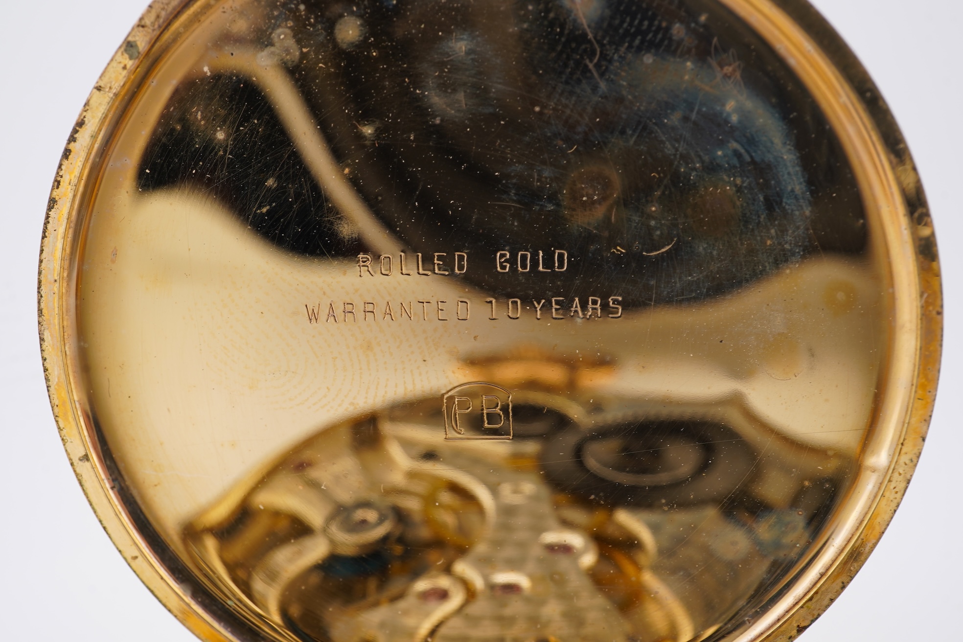 A damaged continental 18k lever pocket watch, together with a rolled gold pocket watch in similar condition.